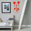 Mickey-mouse-vinyl-decal-sitting-and-smiling-wall