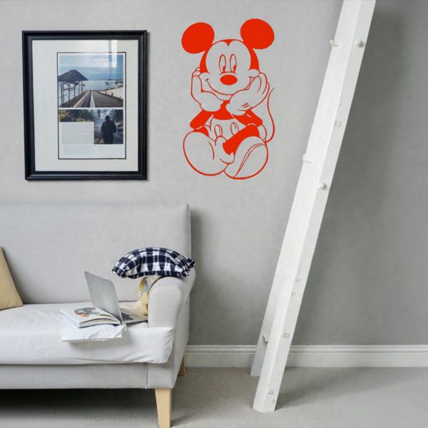 Mickey-mouse-vinyl-decal-sitting-and-smiling-wall
